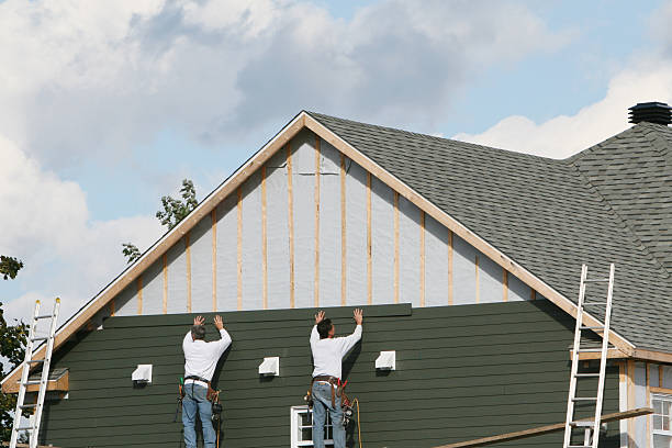 Professional Siding Contractor technician working in Morganville, NJ
